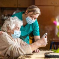 caregiver assisting senior