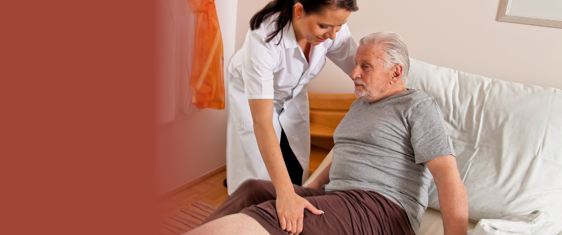 caregiver assisting senior man