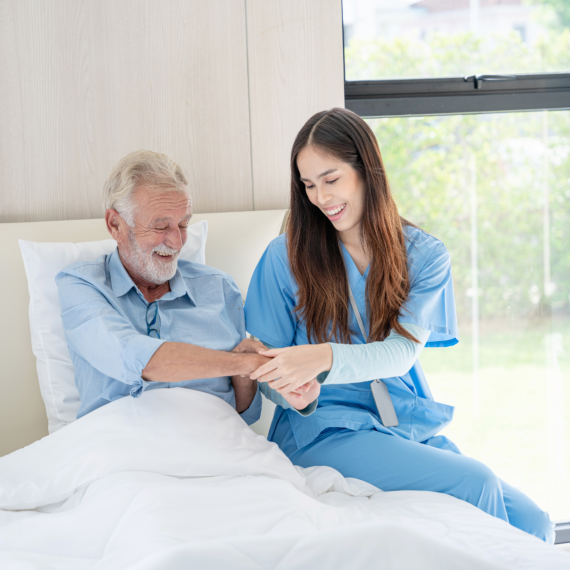 caregiver checking senior man