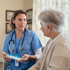 caregiver talking to senior