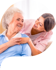 caregiver and senior smiling