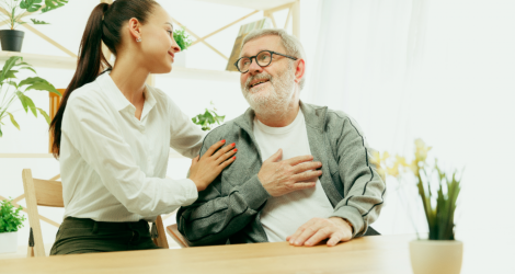 young woman talking to senior