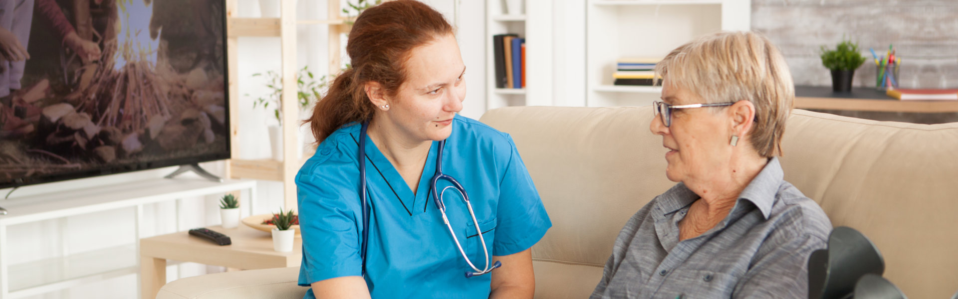 caregiver talking to senior